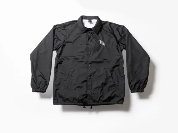 Veste coach Title